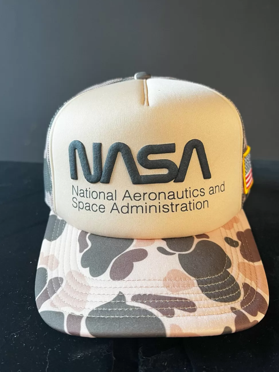 Clearance NASA Gear NASA Worm Logo With US Flag - Camo Trucker Hat